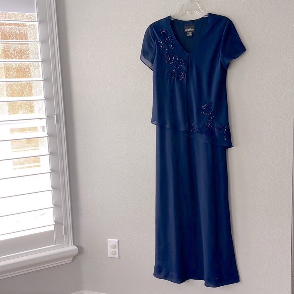 Women’s navy blue short sleeve, two layer dress, V-neck with embroidery in front